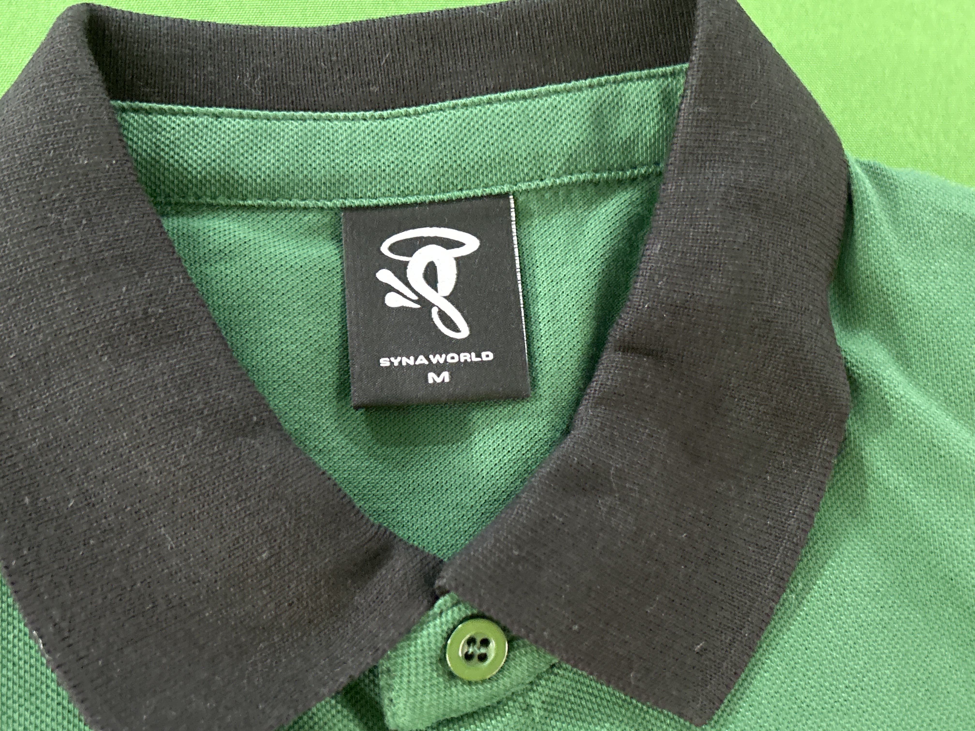 QC Photo - Syna World London Green Polo