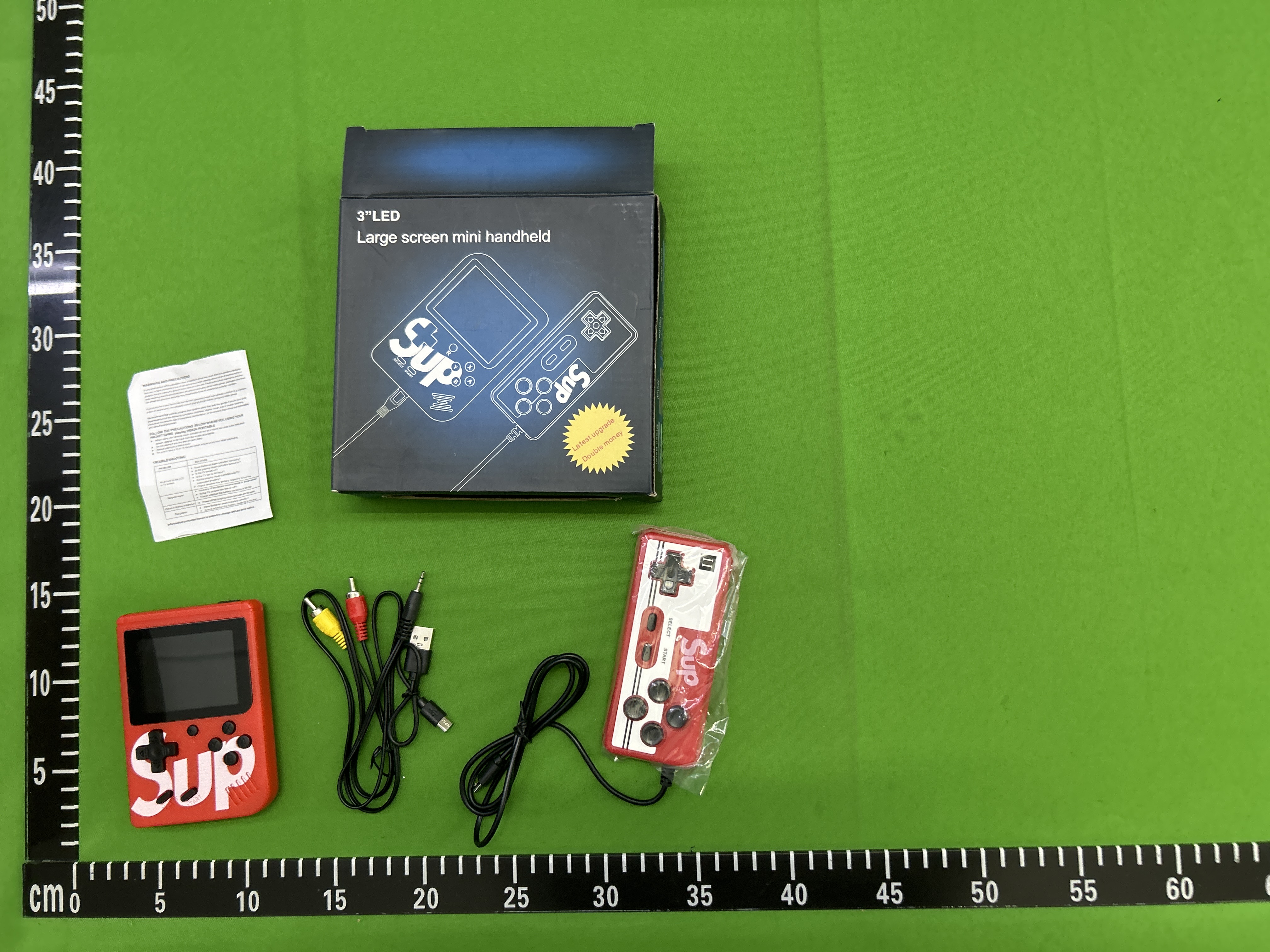 QC Photo - Supreme "Gameboy" Console